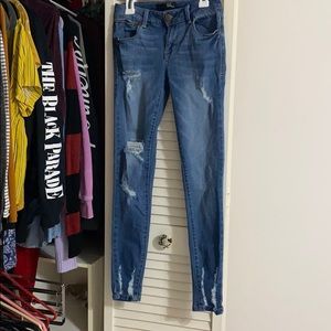 Distressed skinny jeans
